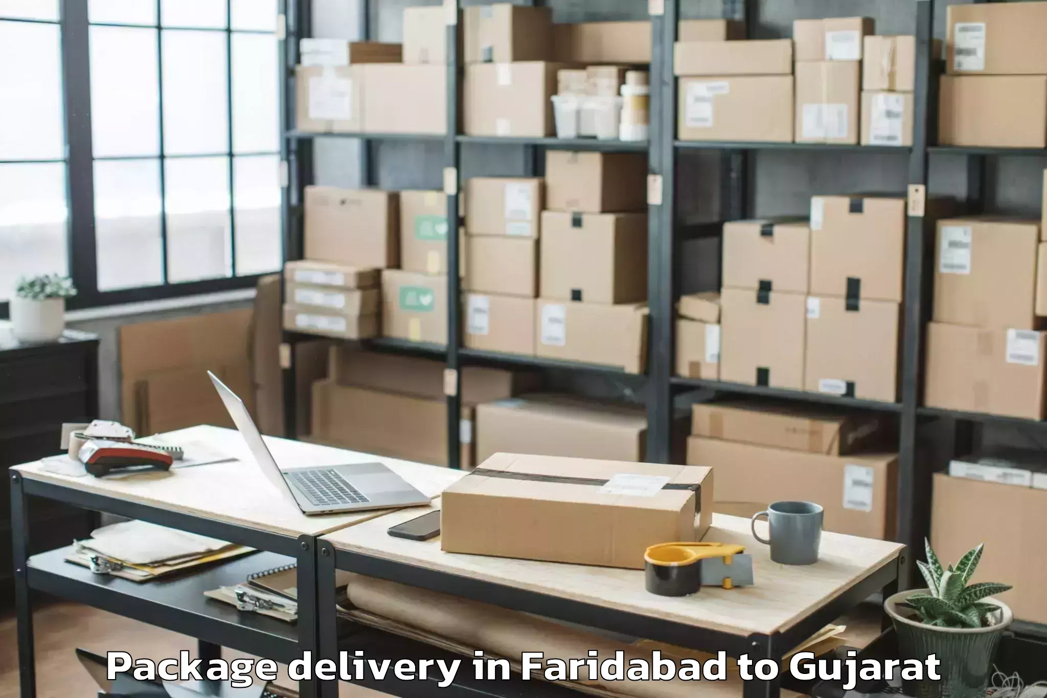 Easy Faridabad to Marwadi University Rajkot Package Delivery Booking